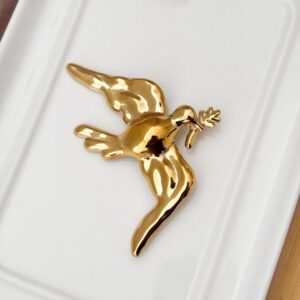 Broche Paz Gold.